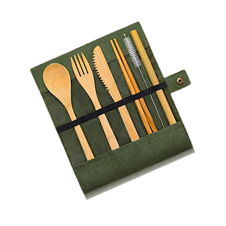 Set of bamboo cutlery including spoon, fork, knife, chopsticks, and straw cleaner in a green case on a white background.